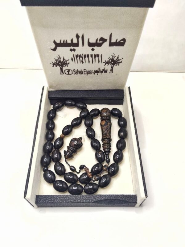 سبحة بيض حمام من اليسر الاسود